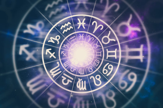 Astrological zodiac signs inside of horoscope circle