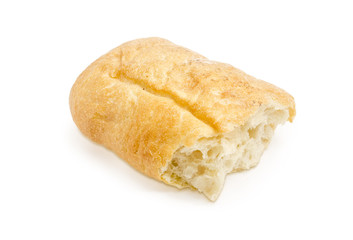 Broken piece of ciabatta on a white background