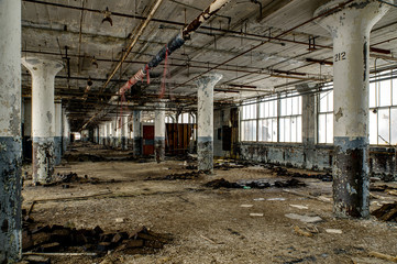 Fototapeta na wymiar Reflective Floors & Still Waters - Abandoned National Acme Factory - Cleveland, Ohio