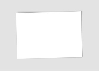 Obraz premium White empty paper sheet with realistic shadow isolated on gray background. Vector illustration