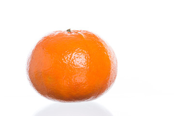 Close up of a mandarin orange isolated on white