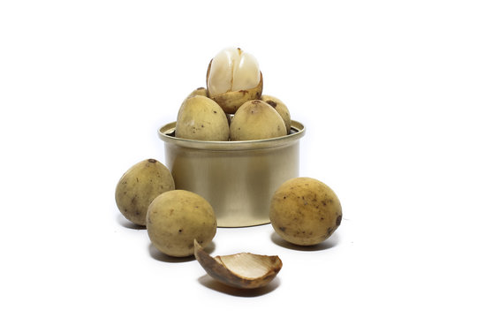 A Bowl Lanzones, Langsat, Duku In Isolated White Background