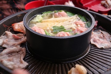 Grilled pork on a shabu pan
