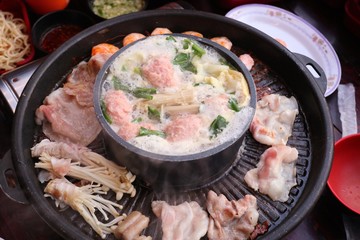 Grilled pork on a shabu pan