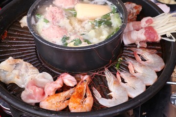 Grilled pork on a shabu pan