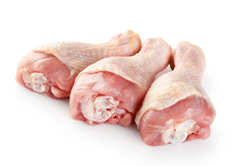 Raw chicken legs isolated on white background.