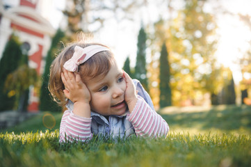 Dreamy Girl Laying on Lawn