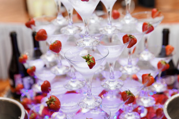 pyramid from glasses of champagne on wedding party