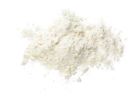 Pile of flour isolated on white background. Top view. Flat lay