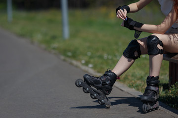 Beautiful young girl roller skating