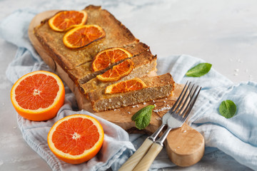 Healthy homemade orange-coconut cake, copy space. Healthy vegan food concept.