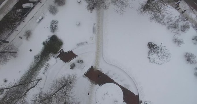 winter city, view from height, view of a city park covered in snow
