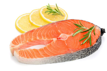 Slice of red fish salmon with lemon and rosemary isolated on white background