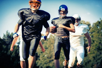 American Football Players Running