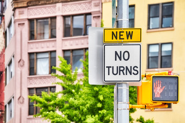 Fototapeta na wymiar No turns traffic sign, selective focus, New York City, USA.