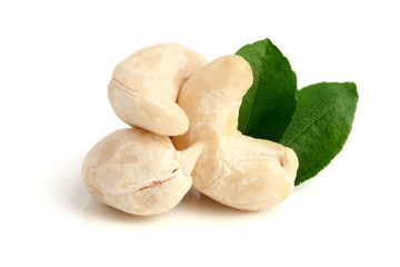 cashew nuts with leaf isolated on white background. macro