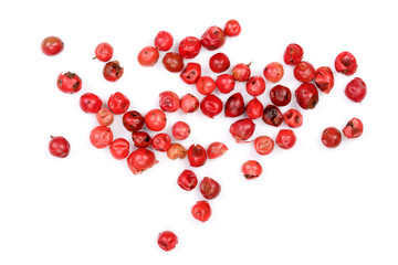 pink peppercorns seeds isolated on white background. Top view. Flat lay