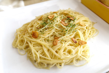 oil base pasta Spaghetti Aglio on the table