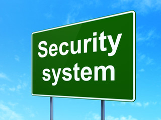 Security concept: Security System on green road highway sign, clear blue sky background, 3D rendering