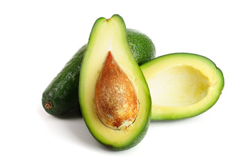 avocado and half isolated on white background close-up