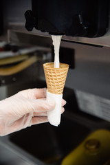 Industrial preparation of creamy ice cream on the kitchen. Restaurant or cafe cuisine