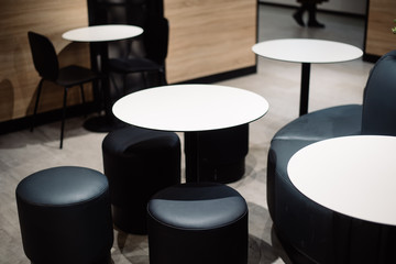 Stylish interior of a cozy restaurant or cafe, black and white color of interior