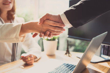 Handshake of business office partnership businesspeople shaking hands colleagues and greeting join...