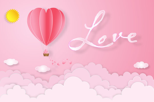 hot air heart balloon on pink sky as love, happy valentine's day, wedding and paper art concept. vector illustration.