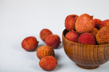 Lychee in a wooden bowl