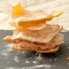 Carnival Italian frappe, pile of frappe on a slate plate, square