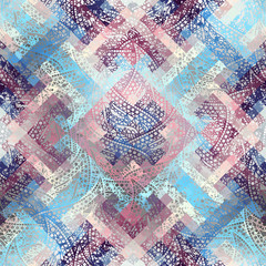 Seamless background pattern. Grunge ethnic pattern with paisley ornament .