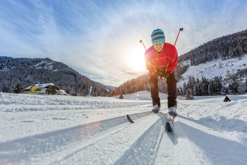Cross-country skiing. Young man doing exercise