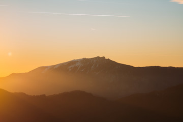Beautiful sunrise on a summer day in Cozia National park, the sky was very clear and we saw the beauties which surround the peak.