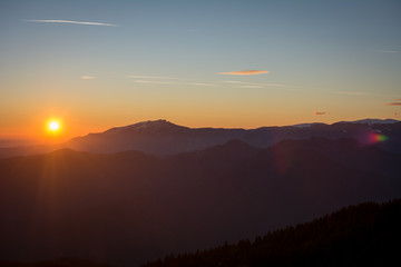 Beautiful sunrise on a summer day in Cozia National park, the sky was very clear and we saw the beauties which surround the peak.