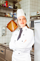 Female Chef In Kitchen