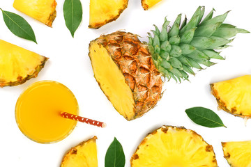 pineapple juice in a glass with pineapple slices isolated on white background. Top view. Flat lay pattern