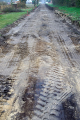 Clear building site for a small road at the edge of a village