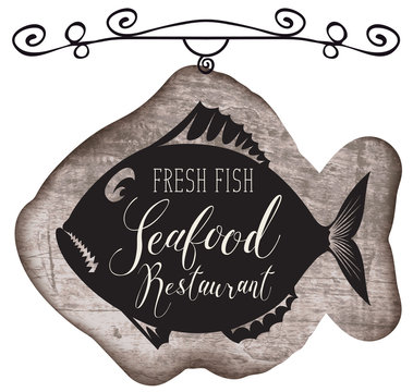 Vector street signboard or banner for seafood restaurant with a picture of fish and handwritten inscription on a wooden background in retro style.