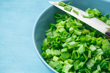 Sliced green onions or scallions in a bowl