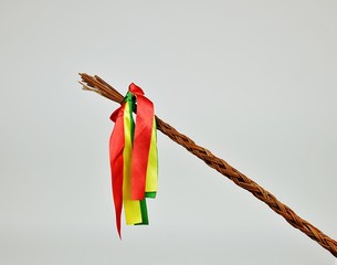 Little easter whip  /  A little easter whip on the light background. Fokus is on the ribbon.