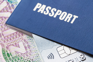 Blue passport with platinum credit card on the schengen visa background. Closeup, selective focus, toned