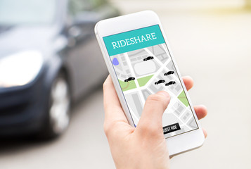 Ride share taxi service on smartphone screen. Online rideshare app and carpool mobile application....