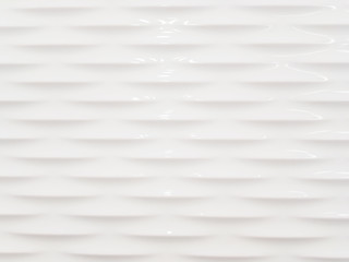Abstract background of white smooth and sleek wall with embossed pattern.