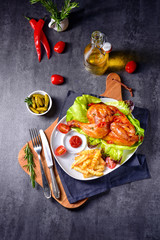 fried chicken with chips and salad