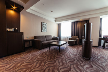 Naklejka na ściany i meble Cozy modern beautiful living room in hotel