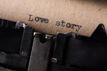 Love story- text message on the typewriter close-up