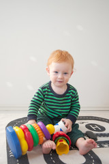 Little boy playing in educational toys