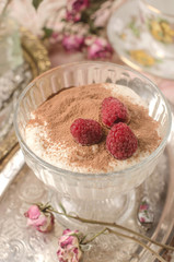 Dessert with raspberry close-up