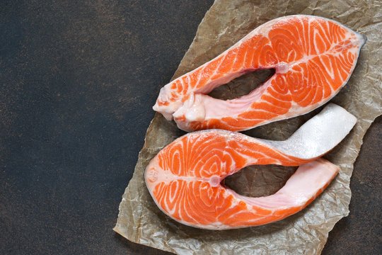 Fresh salmon on a concrete background. Food background. Organic, natural food.