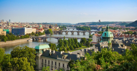 Fototapeta na wymiar Panorama view of Prague skyline with Charles bridge and Vltava river in the late afternoon summer, Czech republic